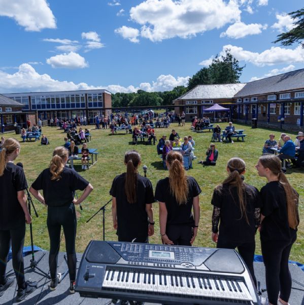 Pupils performing in the Quad